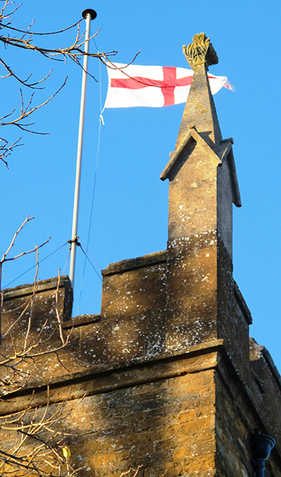 -st_georges_flag_on_the_church_on_remembrance_sunday